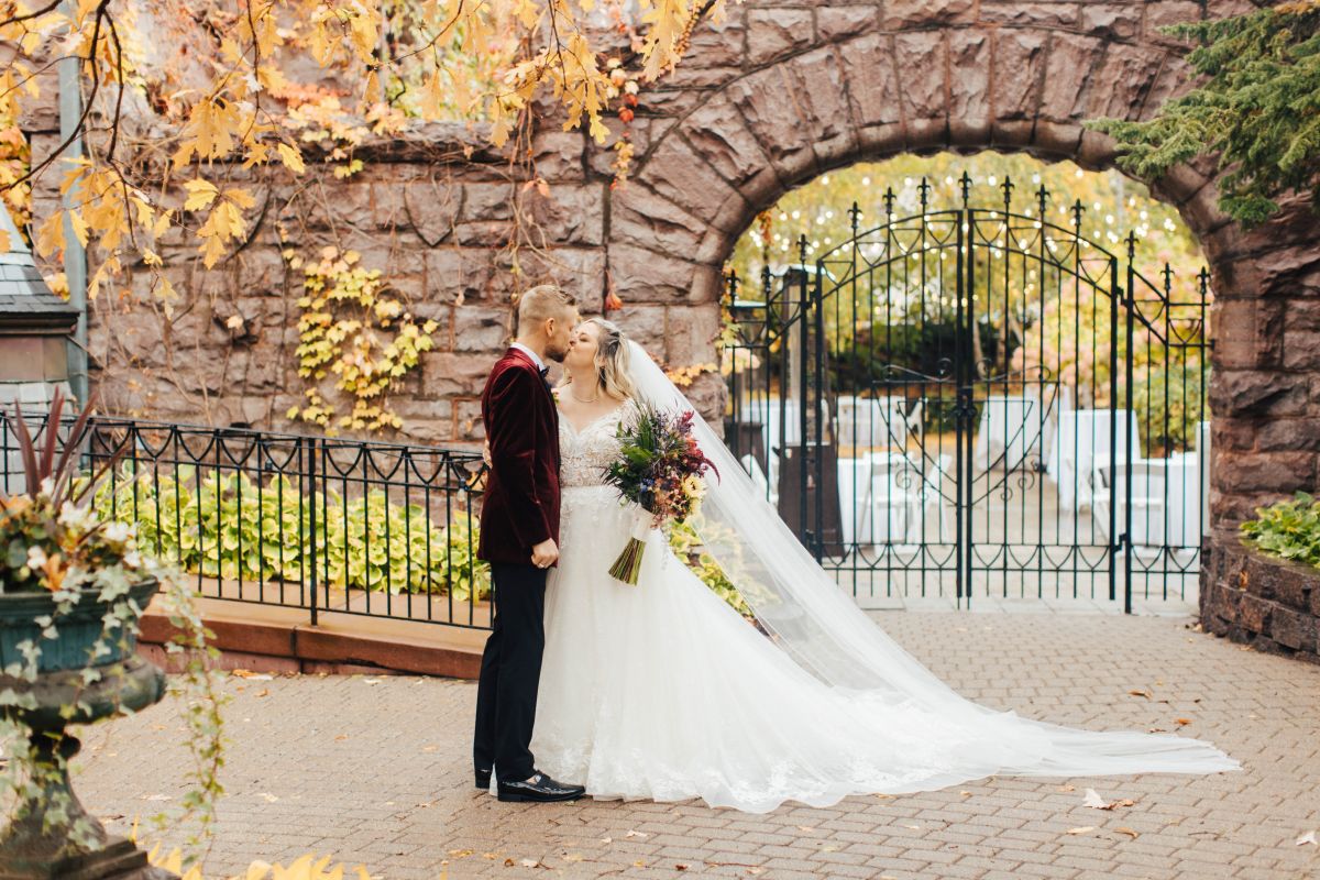 Bride and groom Van Dusen Mansion fall wedding 