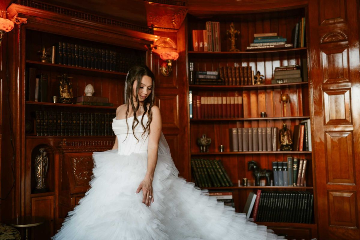 Bride in mansion library