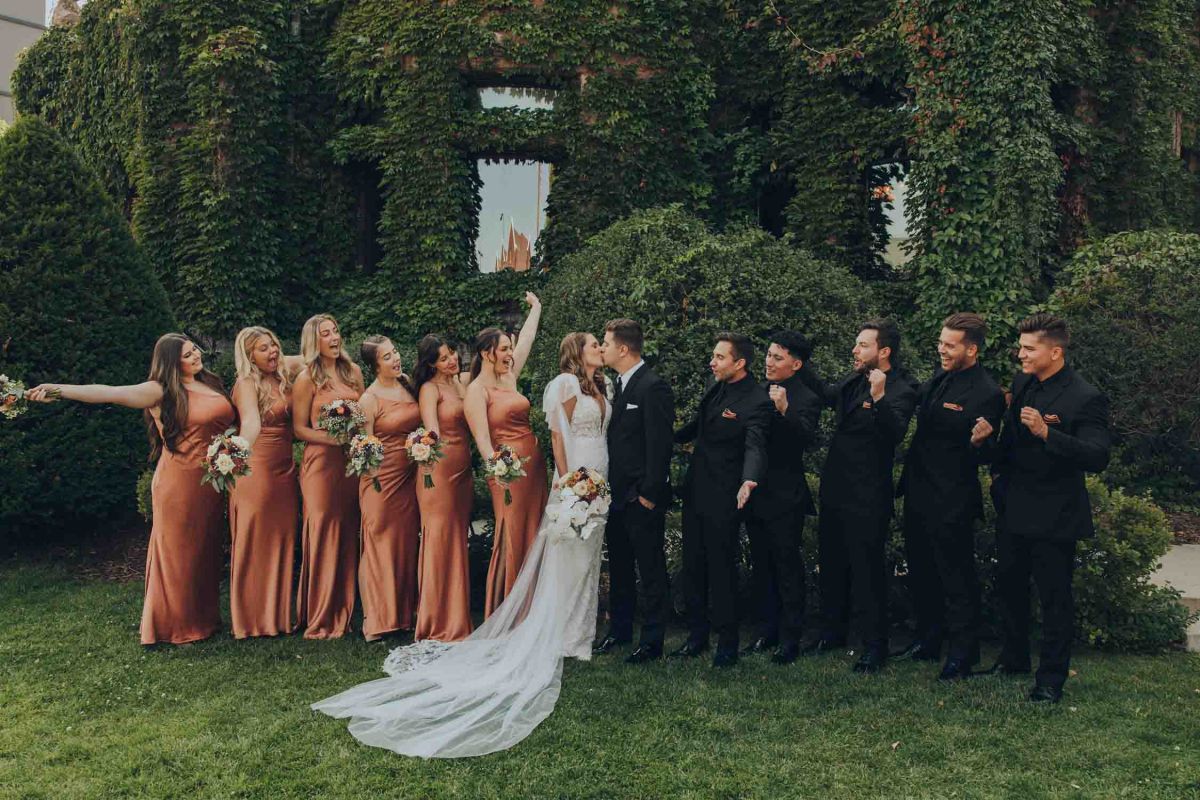 Bride and groom outside the mansion