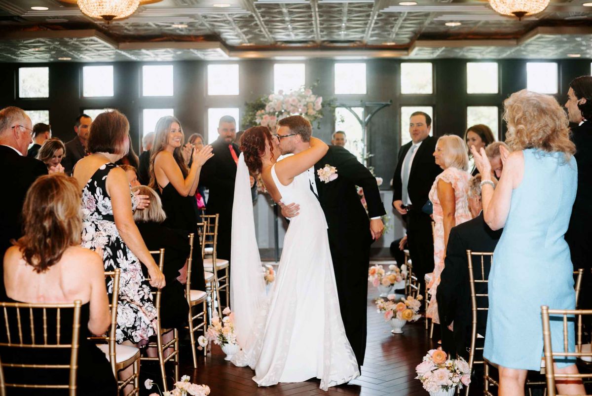 Bride and groom outside the mansion
