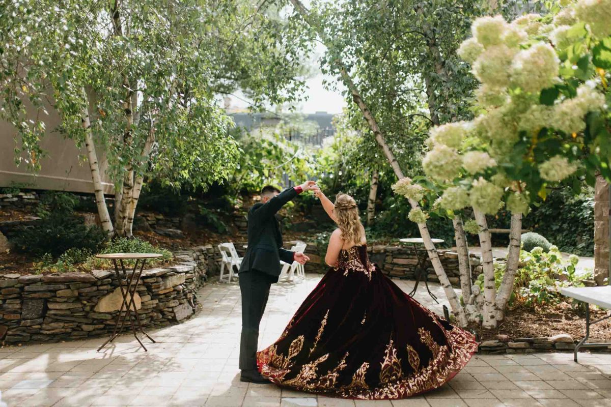 Bride and groom outside the mansion