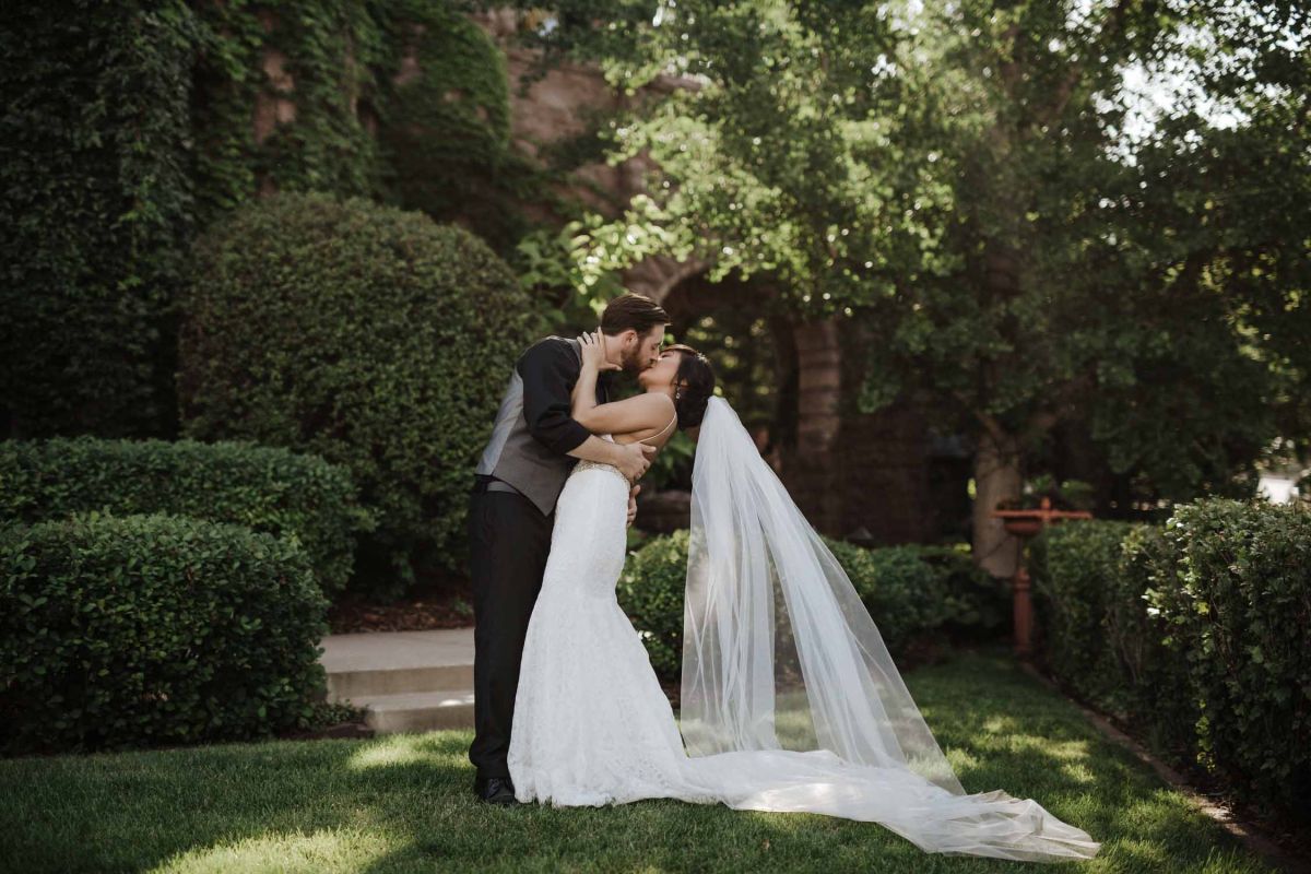 Bride and groom outside the mansion